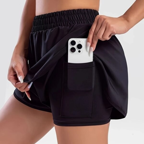 Black women's high waist active shorts with pockets - front view