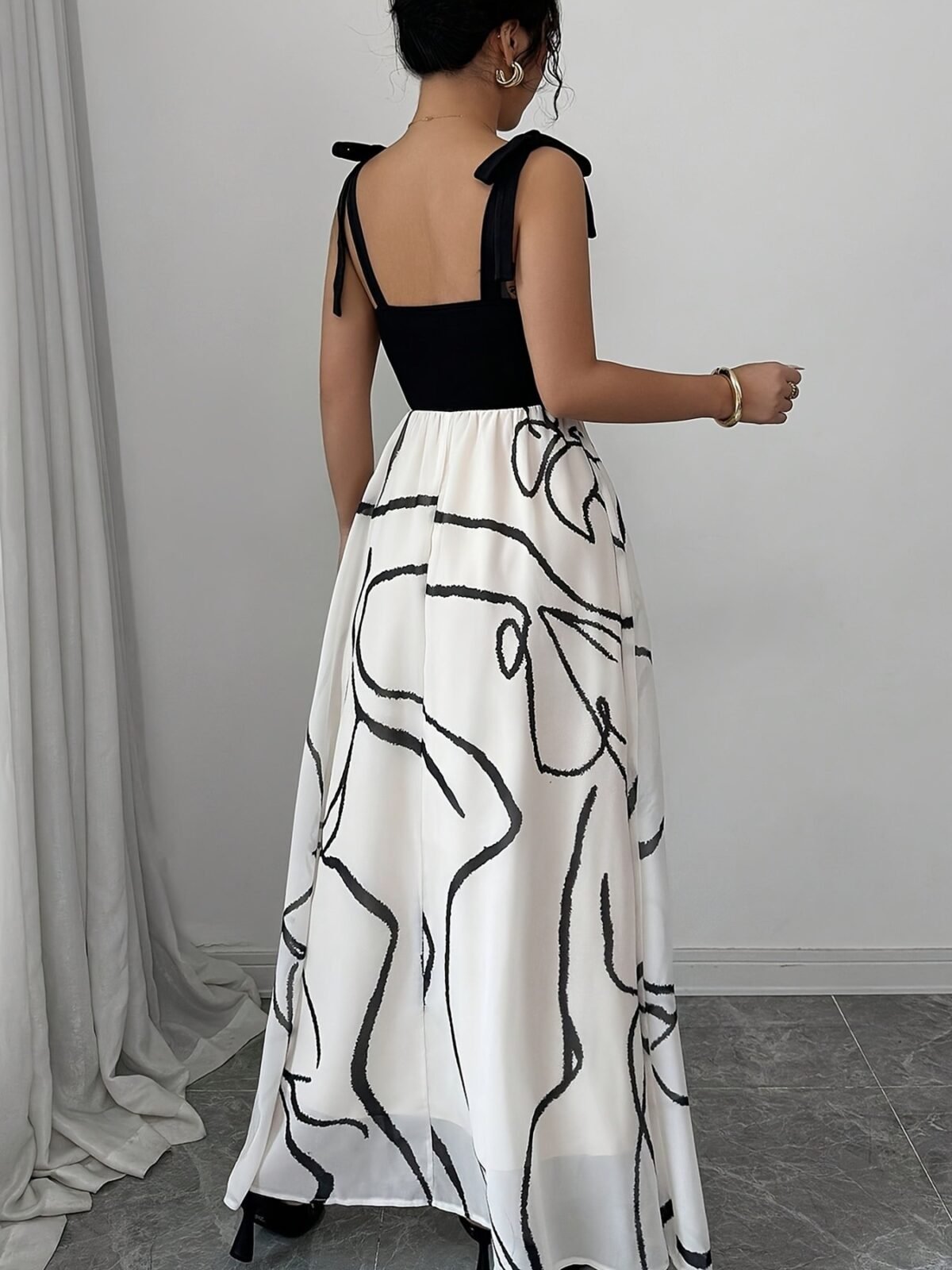 Back view of Tie Shoulder V-Neck Maxi Dress, showing elegant drape