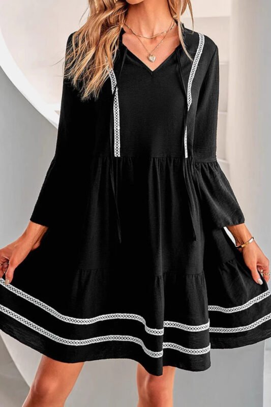 Black Long Sleeve Mini Dress with a Tiered Skirt and Contrast Trim