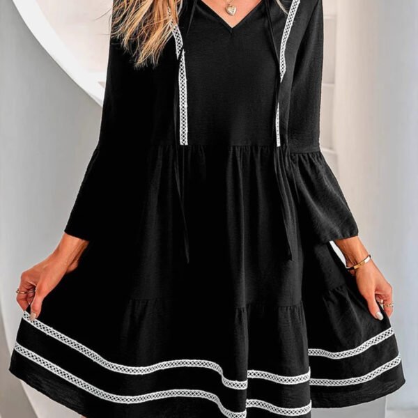 Black Long Sleeve Mini Dress with a Tiered Skirt and Contrast Trim